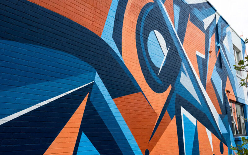 Fresque murale art urbain street art couleurs géométrique